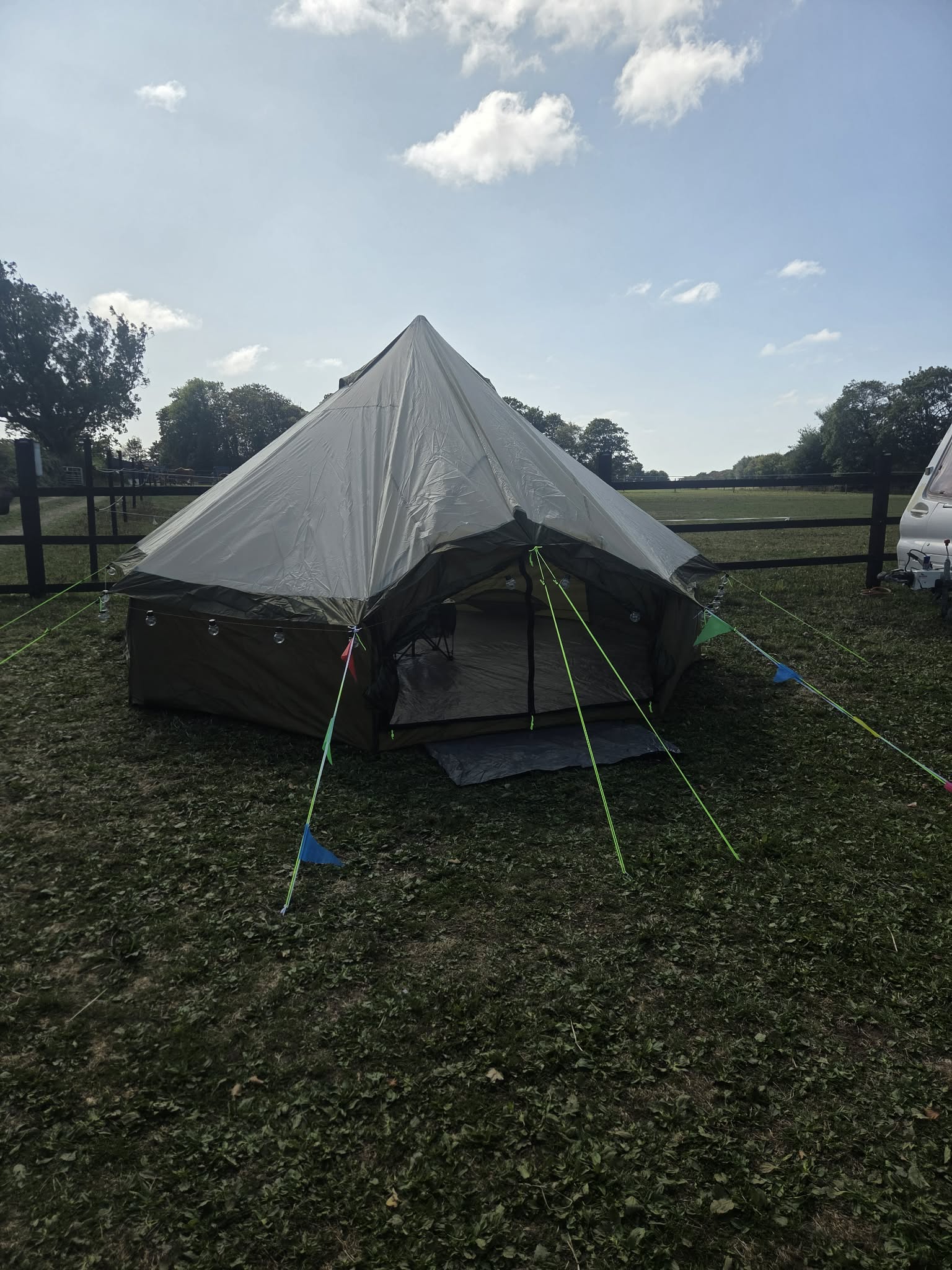 Front exterior view of the T-Pee in the open field